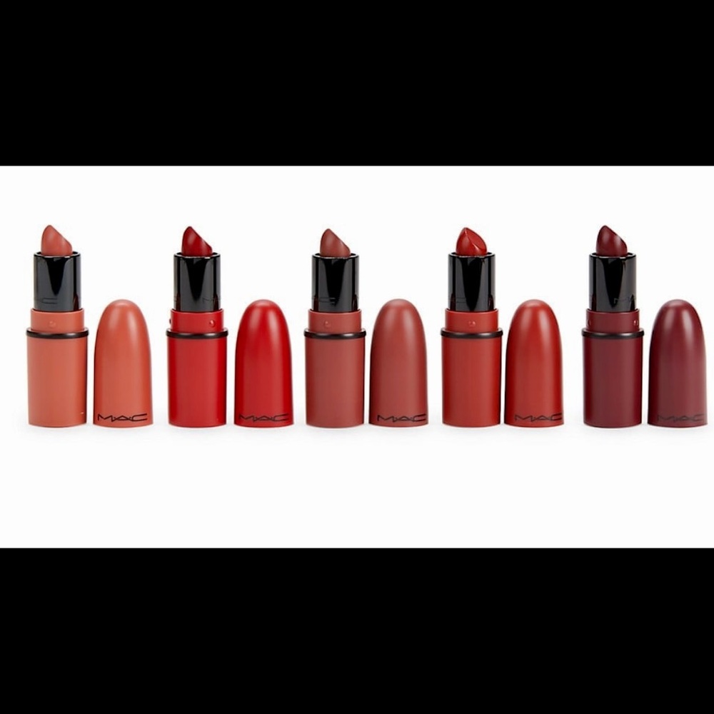 NWT!!! Five mini lipsticks in a travel-themed zip pouch.